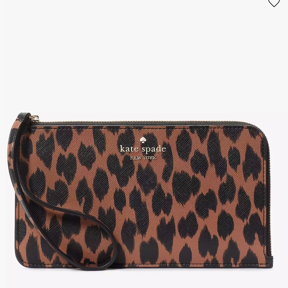 Kate Spade Lucy Medium L-Zip Wristlet
COLOR:
Multi
NWT - Picture 6 of 16